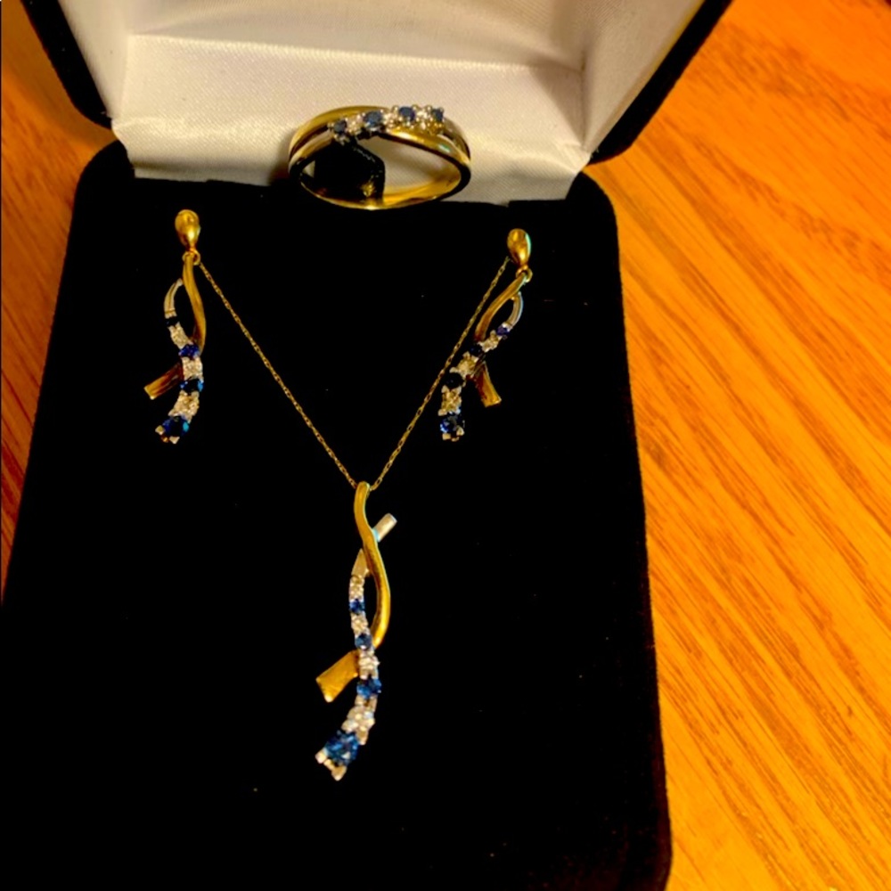 Elegant sapphire, diamond, and gold jewelry set.
